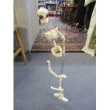 A Pelham skeleton puppet in original box