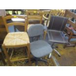 Two office swivel chairs, together with a pair of rush seated bar stools Location: C