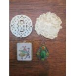 Oriental items to include a Chinese porcelain pendant, a Chinese enamelled pendant and two Jade