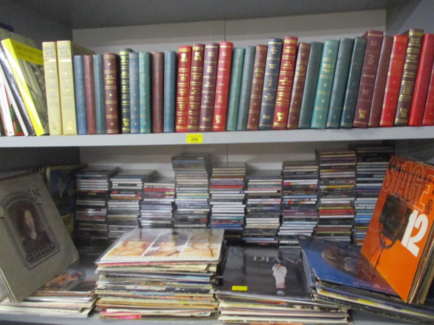 Approximately 300 CDs, together with 133 vinyl records, 1940s to 1990s and a quantity of books