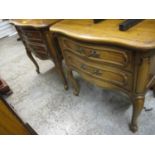 A modern American oak two drawer, serpentine fronted bedside chests, on cabriole legs, 25"h, 24"w