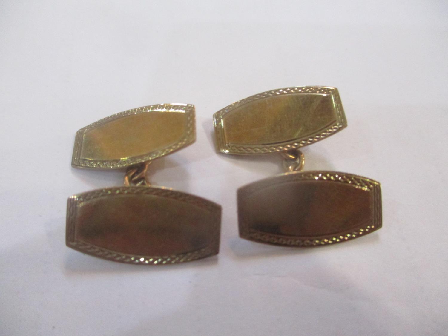 A pair of 9ct gold cufflinks Location: CAB