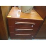 A pair of G-Plan teak bedside chests of drawers, together with a wardrobe