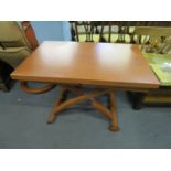 A Connubia Calligari's Mascotte Italian C Dal 1923 cherrywood table, rising to a dining table with