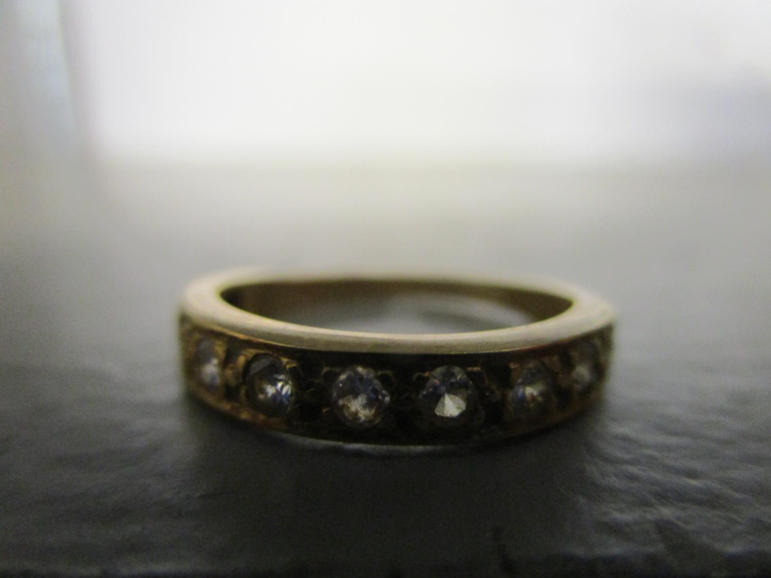 An 18ct yellow gold and diamond ring set with eleven brilliant diamonds Location: CAB - Image 4 of 7