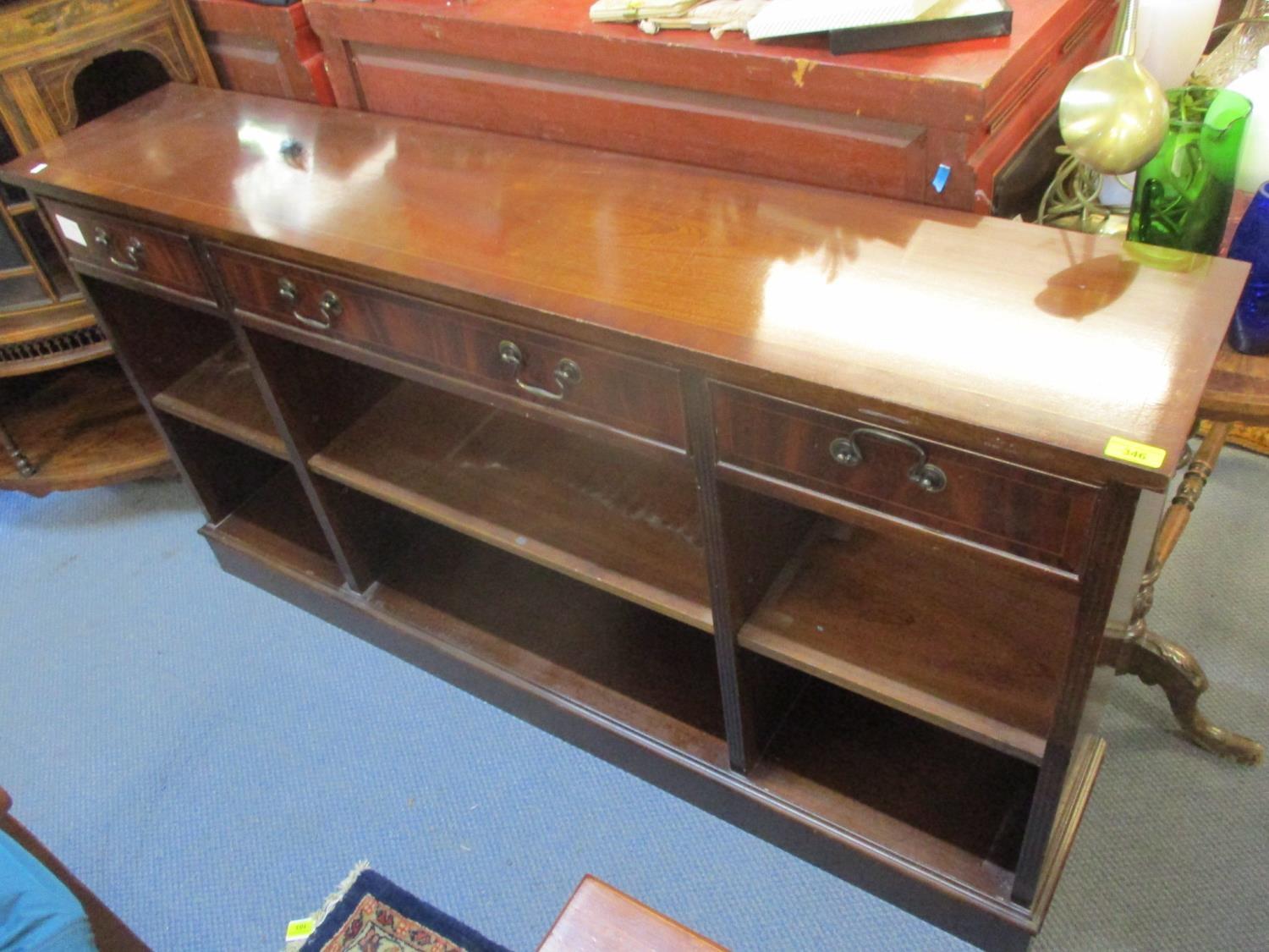 A reproduction mahogany long open bookcase, together with two reproduction mahogany open bookcases