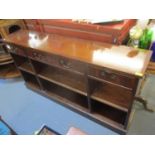 A reproduction mahogany long open bookcase, together with two reproduction mahogany open bookcases