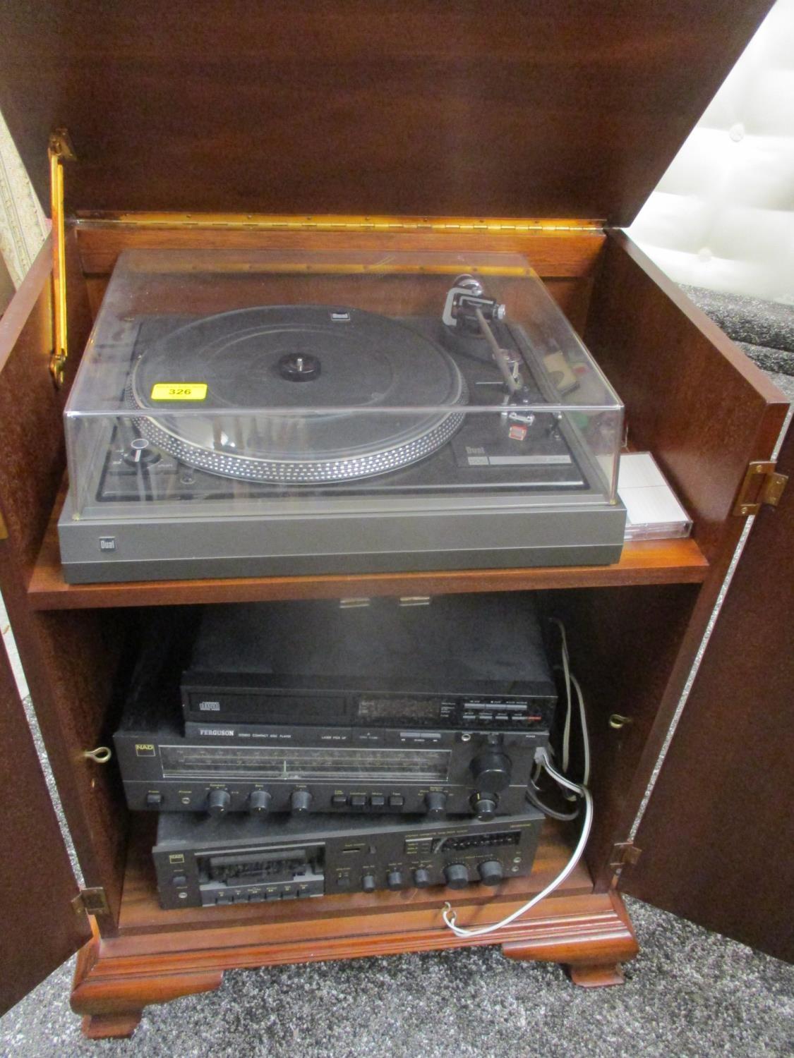 A stereo comprising of a Nad 6050c cassette tape deck, a Nad amplifier, a Ferguson CD player, a Dual