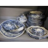 A selection of blue and white dinnerware to include a ladle, teapot and other items