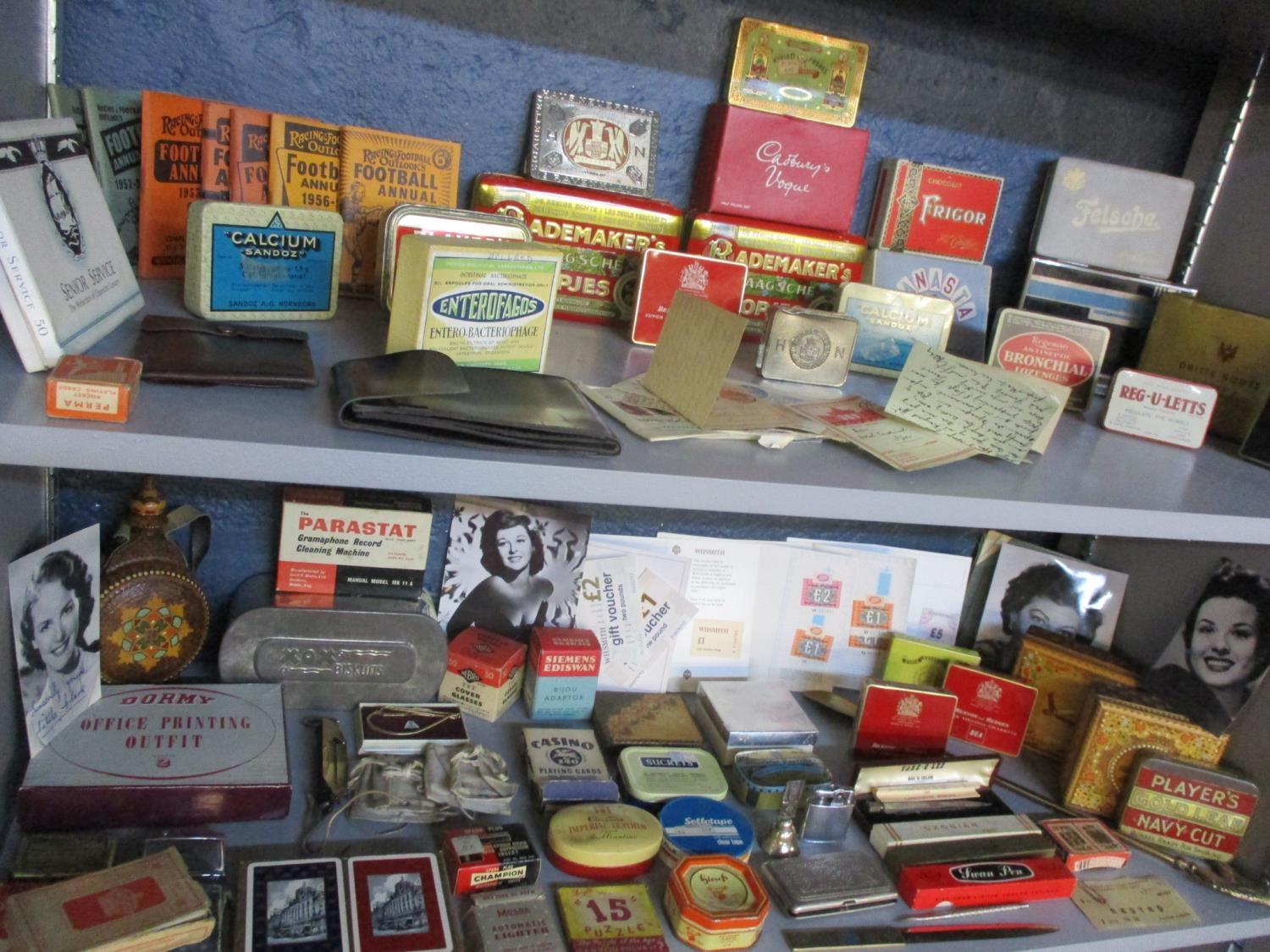 Vintage tins, cigarette boxes, signed film star photographic prints, lighters, pens, late 20th