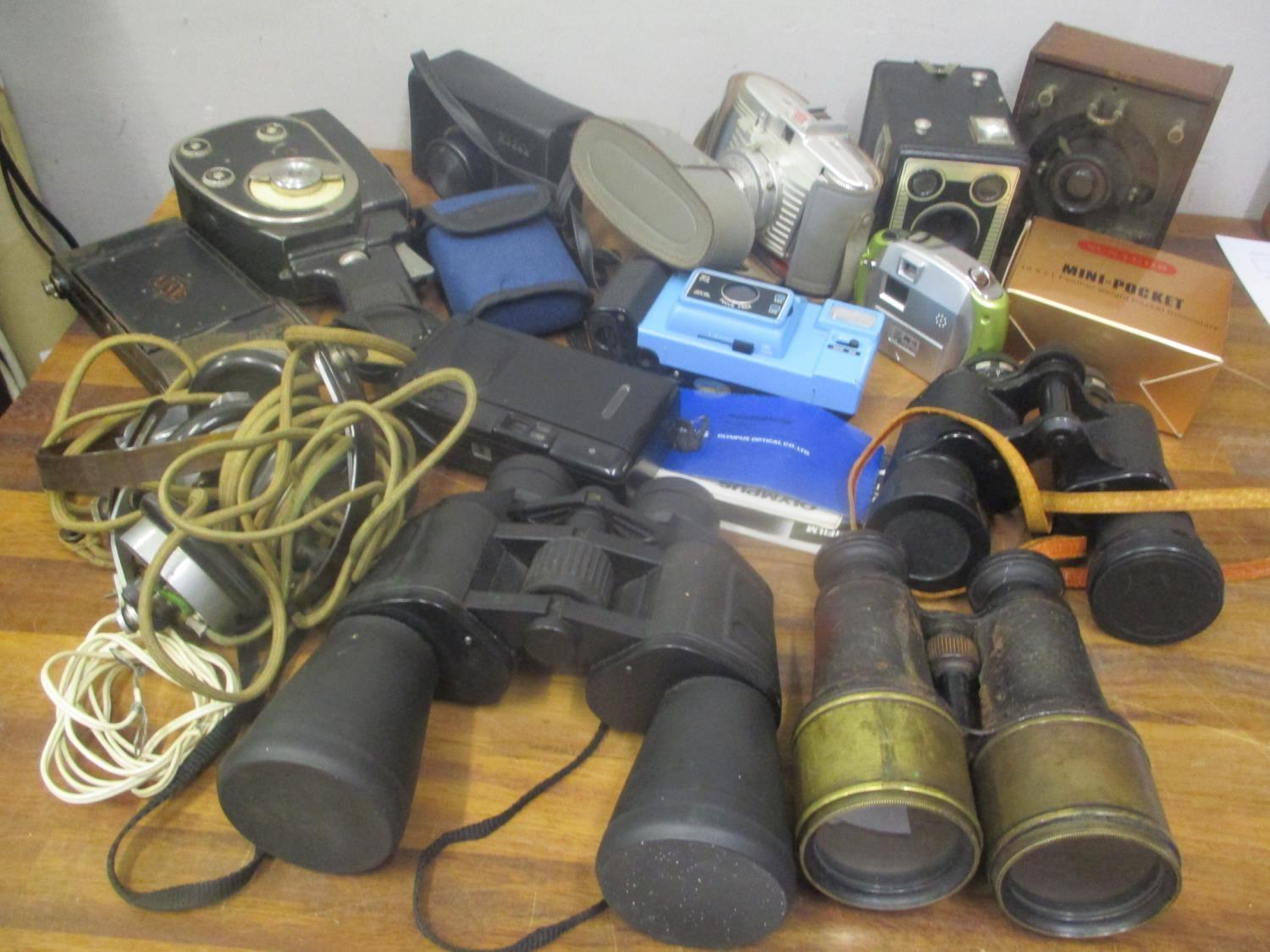 A mixed lot of cameras and binoculars to include a Brownie, Bilara, Kodak and others, together