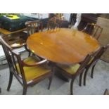 A reproduction mahogany D end dining table, together with a set of eight early 20th century dining