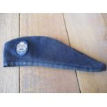 A pre 1970s Bukta girl guide beret with cloth badge