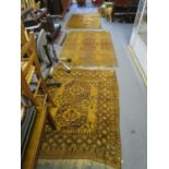 A group of three hand woven Middle Eastern rugs Location: BR