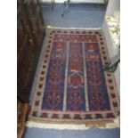 A pair of hand woven rugs to include a Bokhara terracotta ground rug Location: RAF