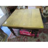 A pitch pine draw leaf dining table on turned legs, 29 6/8" x 40 6/8" x 39 6/8". Location:LAF