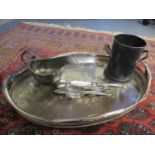 A small quantity of silver plate to include a pierced tray, wine bottle holder, sauce boat and mixed