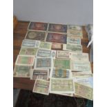 A quantity of early 20th Polish, German and Chinese bank notes