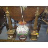 Three table lamps to include a pair of gilt plaster examples