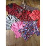 A quantity of late 1970s to 1990s ladies clothing to include a Laura Ashley brown woollen and hooded