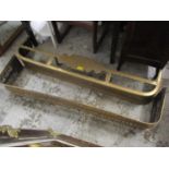 Two Victorian brass fire curbs