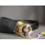 A Dunhill gents dark brown leather belt with gilt buckle, suitable for 42" waistband. Lcation:RWB