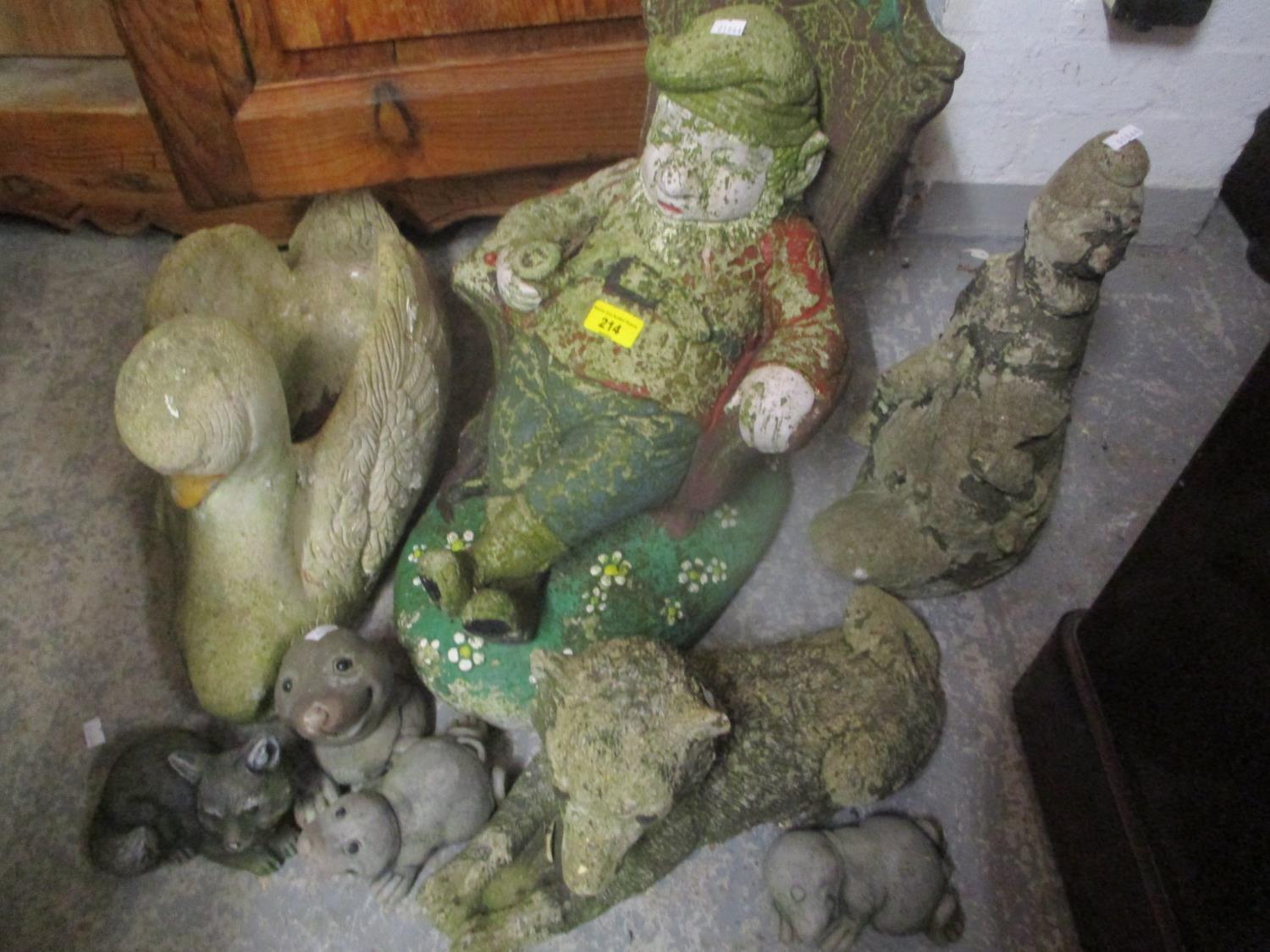 A selection of garden ornaments to include one of a seated gnome