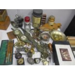 A mixed lot to include horse brasses, compass, trench art, fire bellows, bike lamps and other items