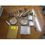 A mixed lot to include a 925 silver toast rack, whistles, silver dish, lighters and other items.