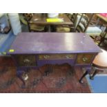 An early 20th century walnut and painted dressing table