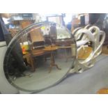 A Bruges circular mirror, together with a Kismet mirror