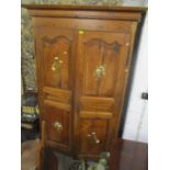 A 19th century French pine armoire having two panelled doors with painted daisy motifs, 84"h x 51