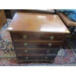 An early 19th century mahogany low chest of four graduated drawers, 29"h x 26"w