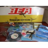 Airline related items to include pilots cloth badges, together with metal models of planes on stands
