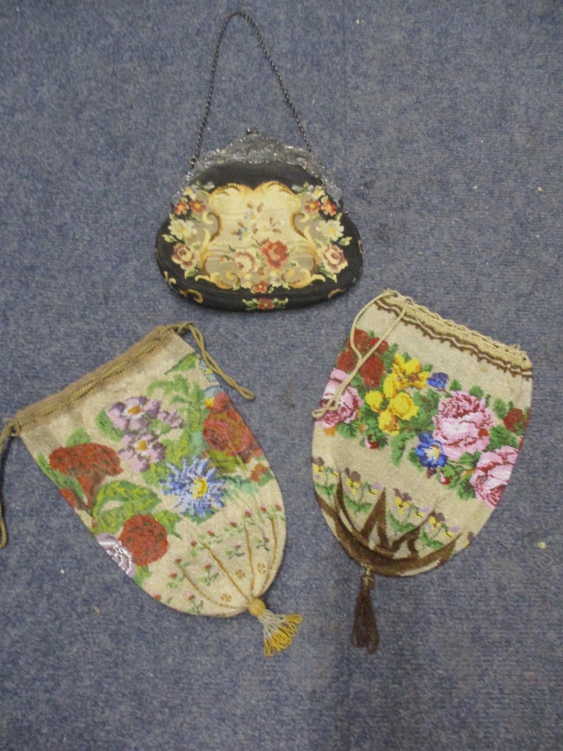 Two mid 20th century oriental style parasols depicting tulips, together with an early 20th century - Image 2 of 4