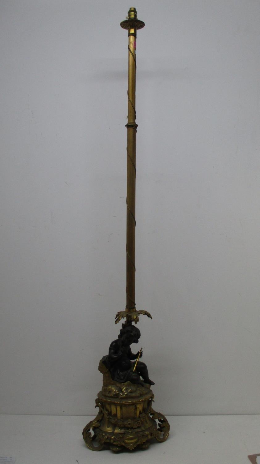 A late 19th century gilt and patinated bronze lamp base, fashioned as a young girl holding a - Image 2 of 9