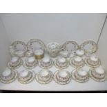 An extensive set of Royal Crown Derby Royal Antoinette pattern tea and tableware, comprising of a