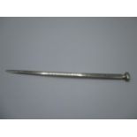 An early 20th century silver meat skewer by Walter H Wilson Ltd with a scrolled handle, 10 3/4"l,