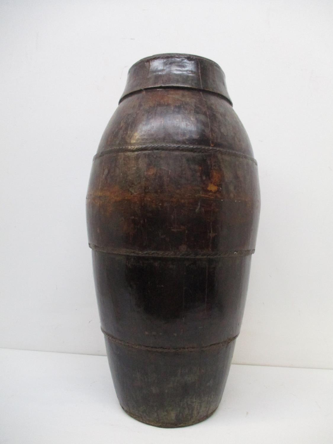 A 19th century Chinese coopered wooden, floor standing barrel of tapered form, with woven metal - Image 6 of 7