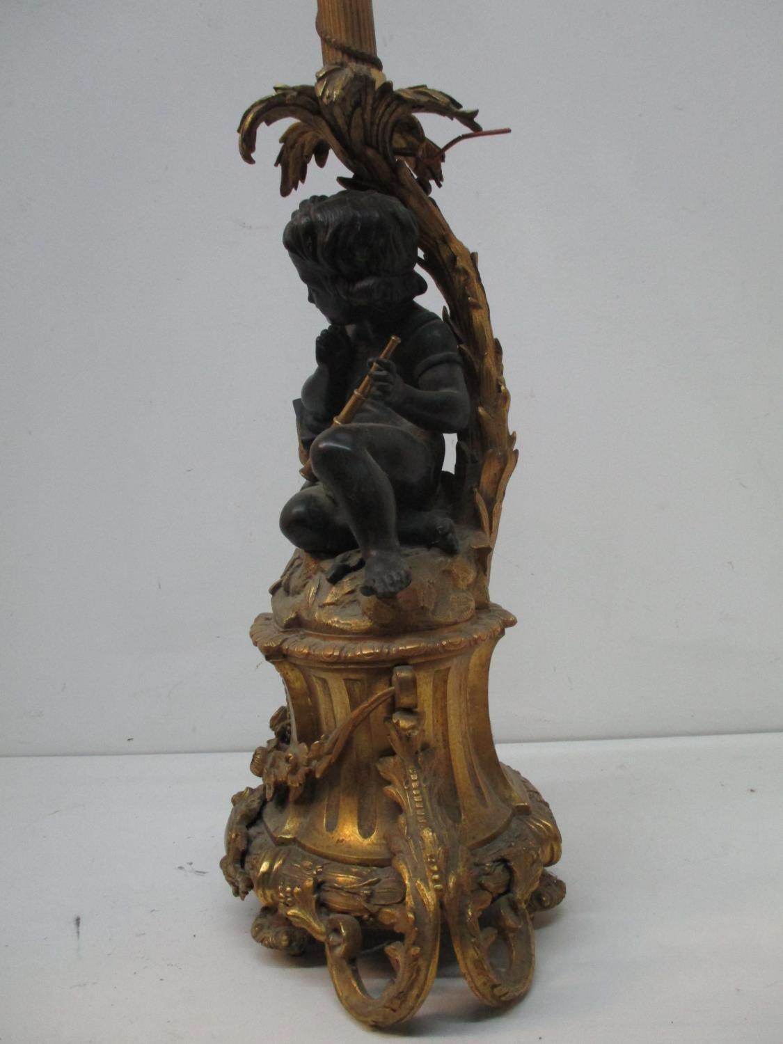 A late 19th century gilt and patinated bronze lamp base, fashioned as a young girl holding a - Image 5 of 9