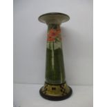 An Edwardian Minton secessionist design jardiniere stand with tube lined flowers in orange on a