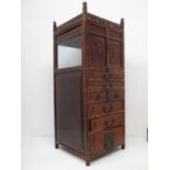 A late 19th/early 20th century Chinese hardwood street vendors noodle cabinet with a galleried