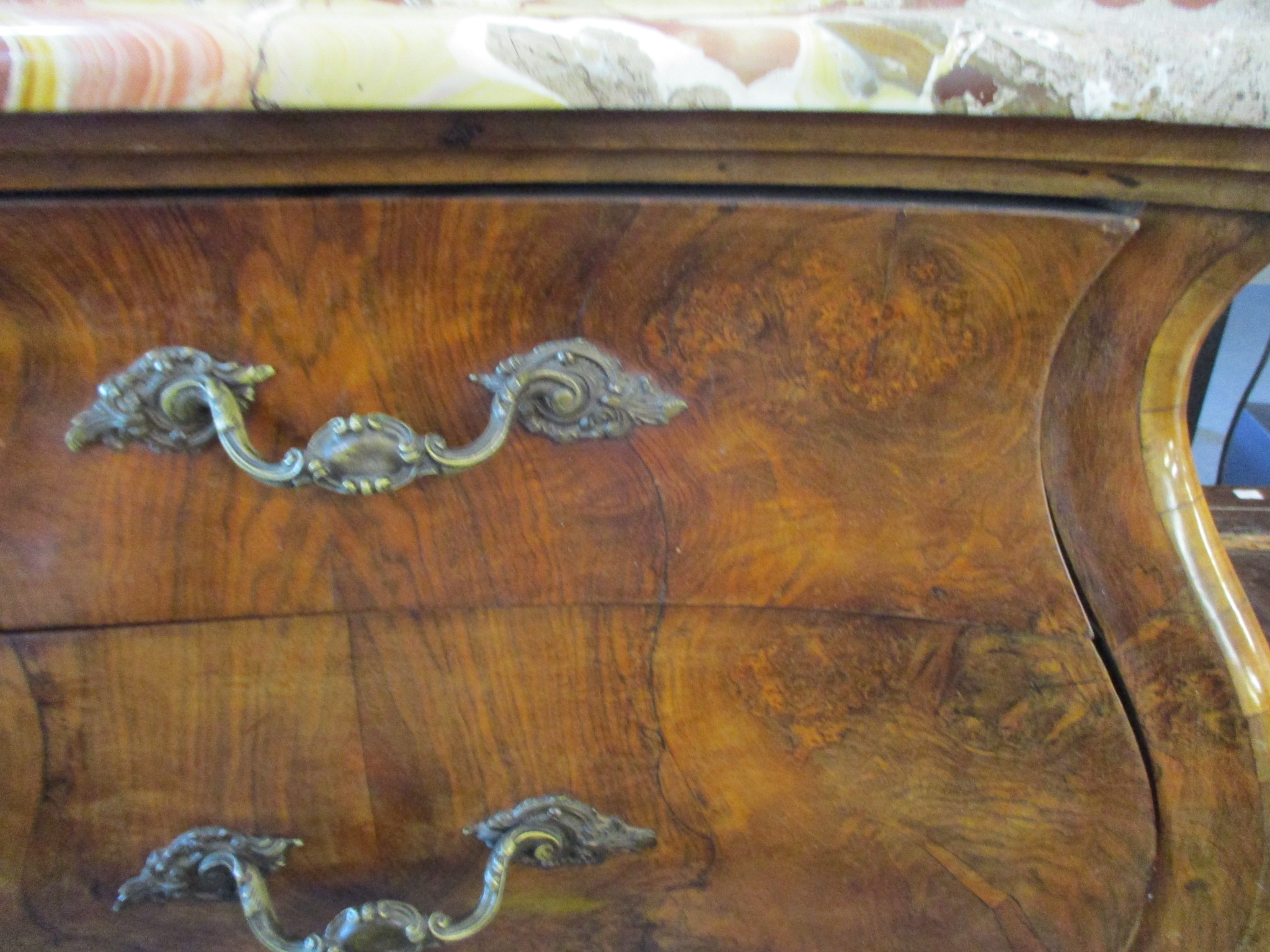 A late 20th century reproduction of a Louis IV walnut bombe commode with a mottled marble top over - Image 5 of 6