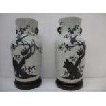 A pair of late 19th century Chinese crackle glazed vases, of tapered form with a flared neck