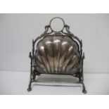 A Victoria silver plated biscuit box with a ring, bird head and scrolled handle, over twin scalloped