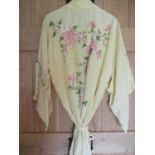 A mid to late 20th century yellow kimono dressing gown with belt, approximate size 12, length 53",