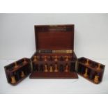 A Victorian mahogany cased games compendium with brass corners and banded edges, the hinged lid