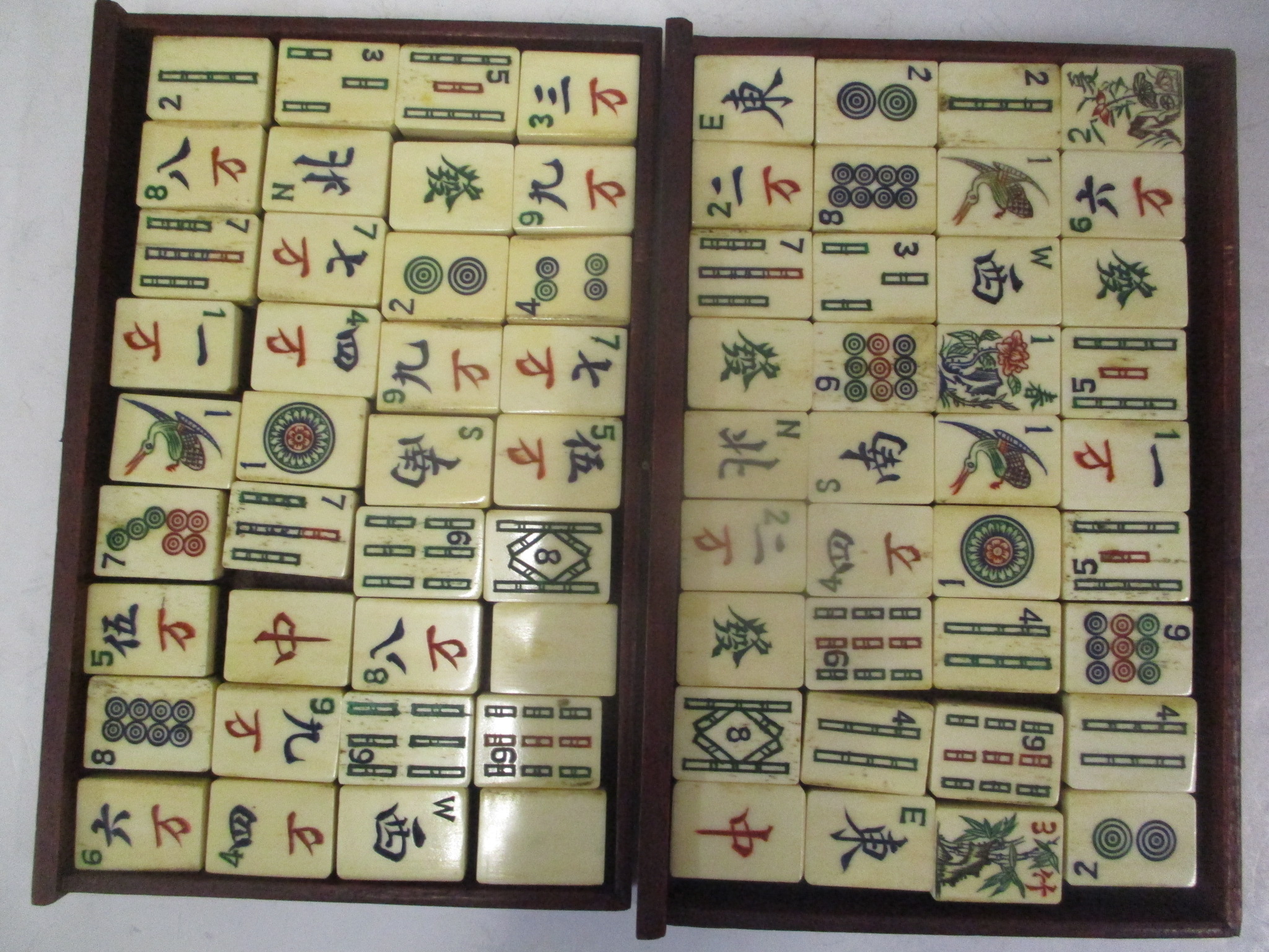 A mid 20th century Chinese Mah Jong set with one hundred and forty eight bone and bamboo tiles, - Image 3 of 8