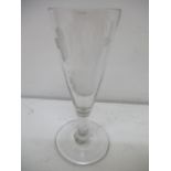 A mid 18th century small ale glass, the conical body engraved with hops and barley, on a splayed