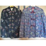 Two mid 20th century Chinese embroidered silk jackets in colourful flowers and pagoda designs,